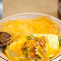 Mexican Omelette with Salsa · Mushrooms, onions, tomatoes, bell peppers, and cheddar cheese.