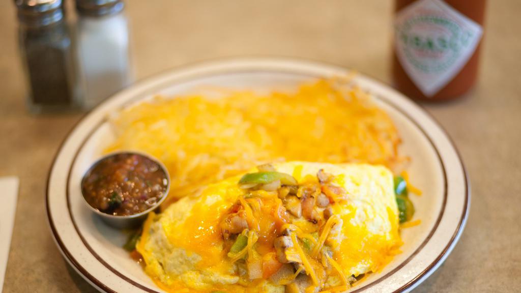 Mexican Omelette with Salsa · Mushrooms, onions, tomatoes, bell peppers, and cheddar cheese.