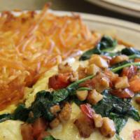 Pollo Loco Omelette · Chicken, spinach, tomatoes, and swiss cheese.