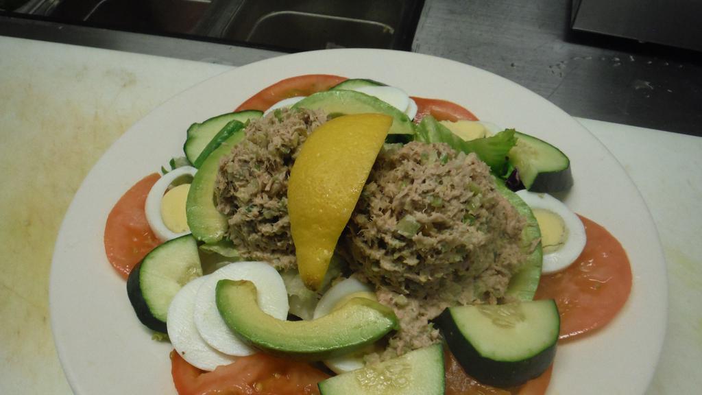 Albacore Tuna Salad · With tomatoes, sliced egg, avocado, and cucumbers.