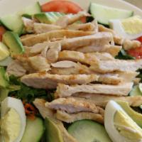 Chicken Salad · Grilled chicken with tomatoes, sliced egg, avocado, and cucumbers.