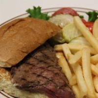 New York Steak Sandwich · 8 oz. choice cut. Served on a French roll. Cooked to perfection.