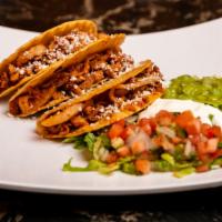 Taco Crispy (3) · Choice of meat, lettuce, cheese, guacamole, sour cream and salsa.