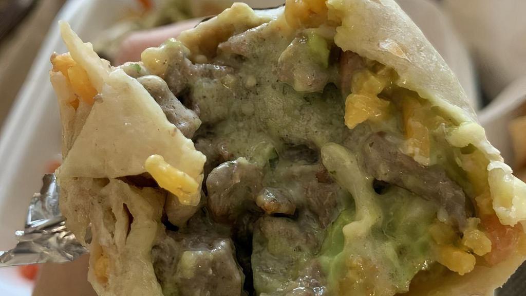 Super Burrito · Choice of meat, rice, beans, guacamole, cheese, sour cream and salsa. Add meat for an additional charge.
