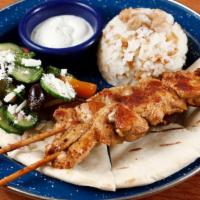 Chicken Rice Plate · Free range chicken with rice, chickpeas, orzo, kalí Greek salad, yogurt-dill sauce & pita