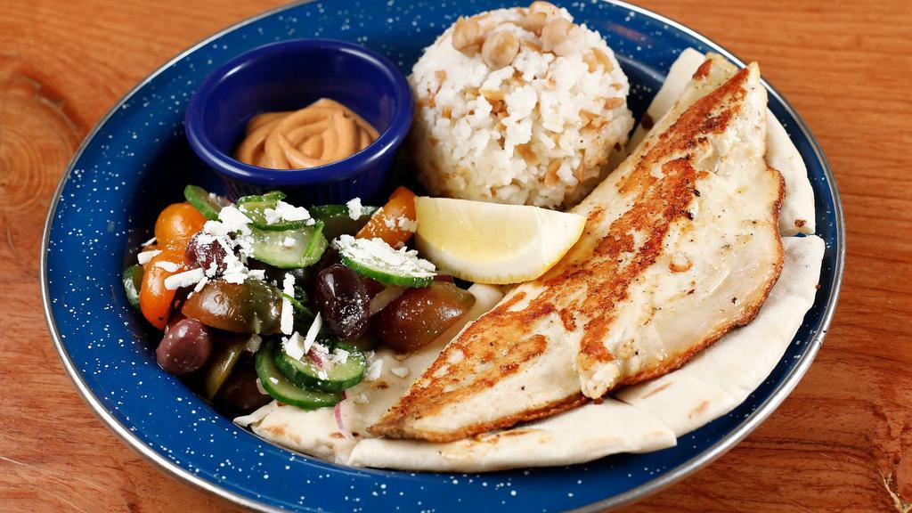 Fish Rice Plate · Grilled Barramundi filet, Rice, Chickpeas, Orzo, Kali Greek salad, paprika aioli & Pita