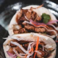 Braised Pork Belly Buns (2) · Chinese inspired thick cut soy braised pork belly served with pickled vegetables and Hoisin ...