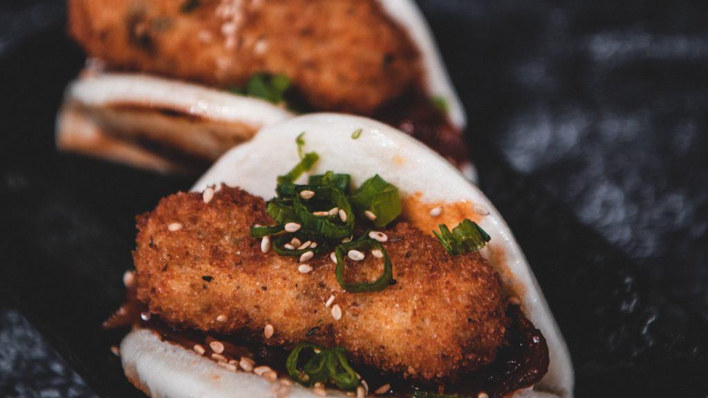 Crispy Bbq Tofu Buns (2) · Marinated tofu covered in panko bread crumbs then fried until crispy with assorted vegetable bbq glaze poured over on top