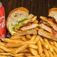 Spicy Cajun Chicken (Basket) · Grilled chicken breast with Cajun, mayo, lettuce, tomato, cheddar cheese.