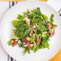 Greek Salad · Chopped lettuce, tomatoes, cucumbers, black olives and feta cheese. Vinaigrette dressing.