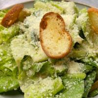Caesar Salad · Romaine, traditional hand made anchovy egg dressing and Parmesan cheese, croutons. Contains ...