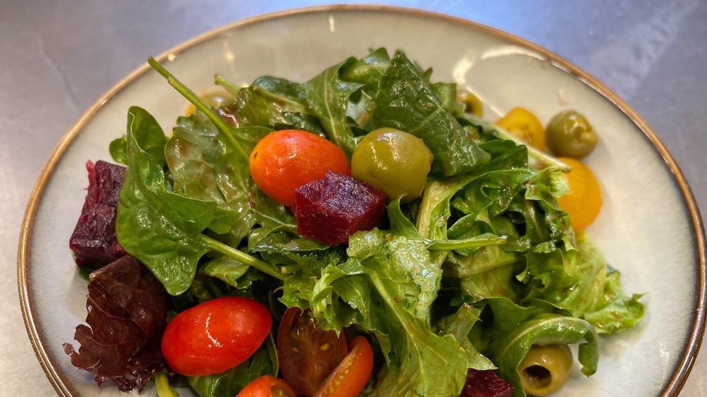 Mixed Greens Salad · Mixed greens, olives, roasted beets, cherry tomatoes, balsamic vinaigrette.  Gluten Free.