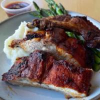 Roasted Baby Back Ribs with BBQ Sauce · Roasted Baby Back Ribs with BBQ Sauce and veggies. 

With your choice of: herb rice, mashed ...
