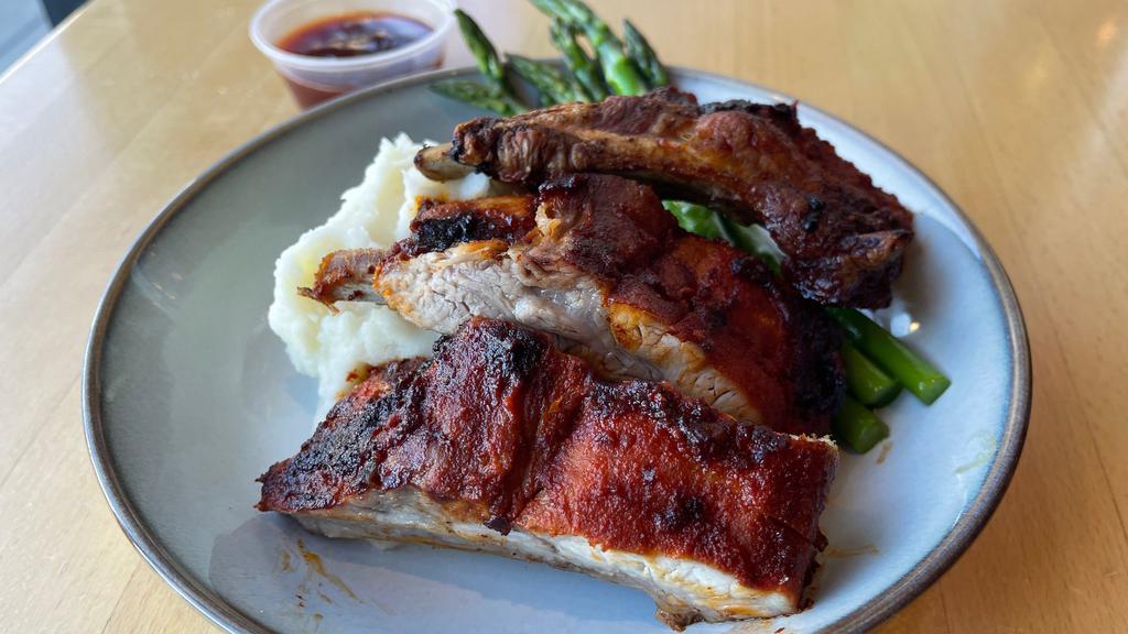 Roasted Baby Back Ribs with BBQ Sauce · Roasted Baby Back Ribs with BBQ Sauce and veggies. 

With your choice of: herb rice, mashed potatoes, roasted potatoes, just veggies, or mixed greens salad.