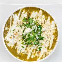 Green Chicken Enchilada Soup · Sour cream, crispy tortilla strips, queso fresco and cilantro.