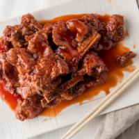 #506. Peking Pork Chop · Deep fried pork chop with special sweet peking sauce.