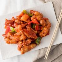 #C606. Sweet & Sour Chicken · Deep fried chicken sautéed in sweet & sour sauce with bell peppers, onions, pineapples and c...