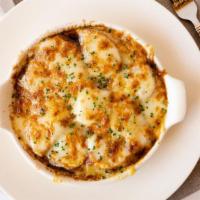 The Best Part Of French Onion Soup · 750cal sweet onions, garlic crostini, gruyere, provolone, parmesan, chives,