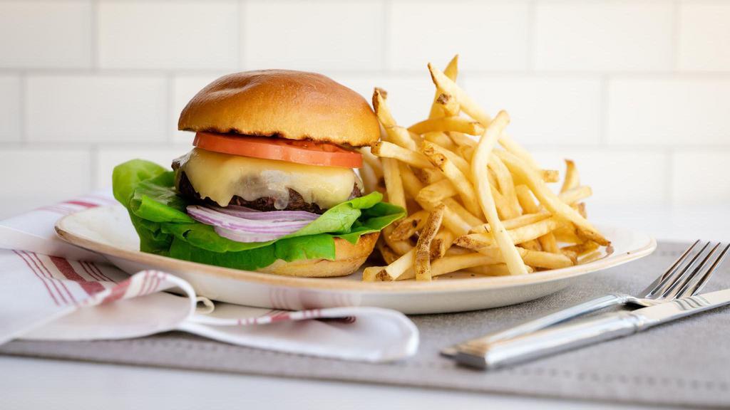 Nordstrom Burger · 1500/1140 cal. sharp white cheddar cheese, lettuce, tomato, red onion, roast garlic aioli, toasted artisan bun, Salt and Pepper crush french fries and kalamata aioli or side salad with Beyond Burger patty for an extra charge