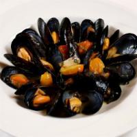 Cozze in Guazzetto · Mussels steamed in garlic, wine, fresh tomato and basil.