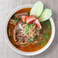 Spicy Sate Pho (Phở Satê) · A creamy and spicy coconut peanut broth served with slices of beef brisket and steak.