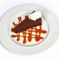 Chocolate Decadence Cake · Flourless Cake, Sour Cherry Compote, Orange Mascarpone Whipped Cream