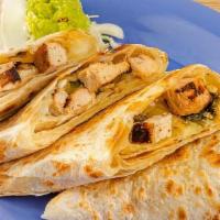 Classic Fajita Quesadillas · Toasted tortilla filled with jack cheese, poblano peppers & onions, and your choice of prote...