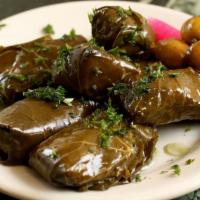Dolma (V,GF) · Grape leaves stuffed with rice and spices
Vegan & Gluten Free