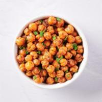 Crispy Harissa Chickpeas · Our signature crunchy chickpeas tossed in a spicy harissa seasoning