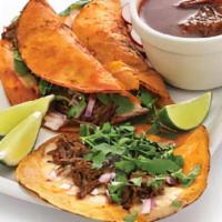 Quesabirria Tacos · Two Crispy corn tortilla tacos stuffed with Oaxaca cheese and homemade beef birria. Served w...