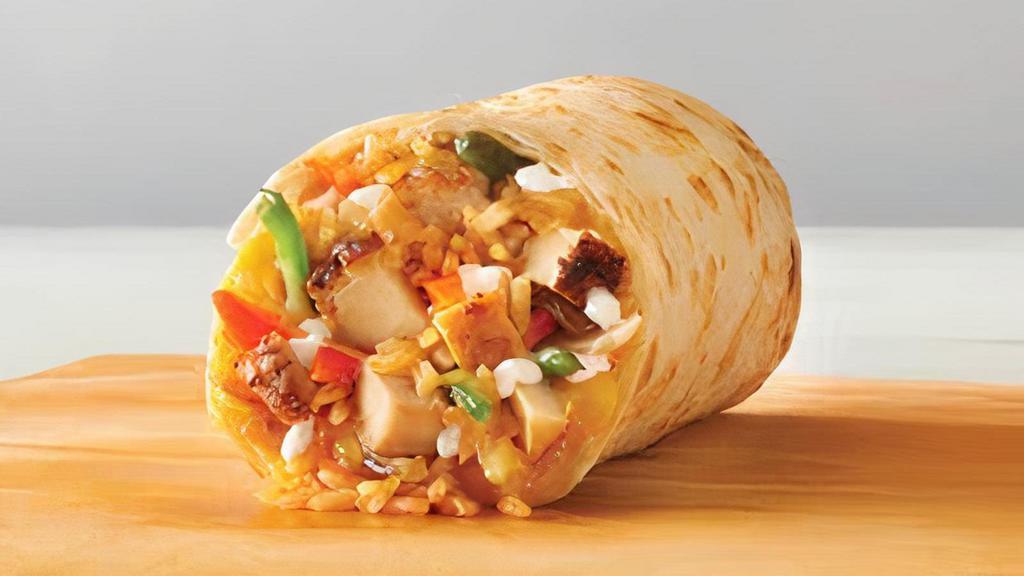 Fajita Burrito · Choice of filling sautéed with red and green bell peppers, onions, garlic and mild salsa, Spanish rice, cheese, sour cream.