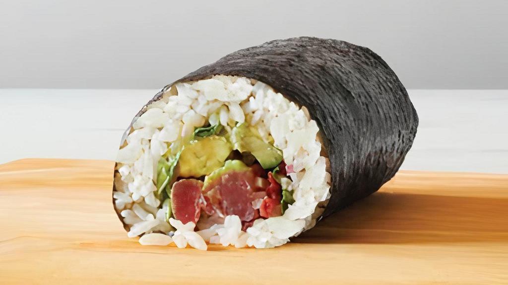 Ahi Tuna Roll · Nori wrap, sushi rice, wasabi ginger sauce, arugula, guacamole, pickled red onions, pickled daikon, cucumber, tobiko, tempura crunch