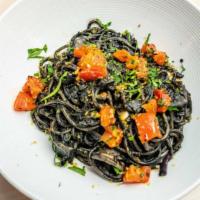 Spaghetti Al Nero di Seppia E Bottarga · Spaghetti, squid ink, calamari, spicy calabria peppers, “bottarga”.