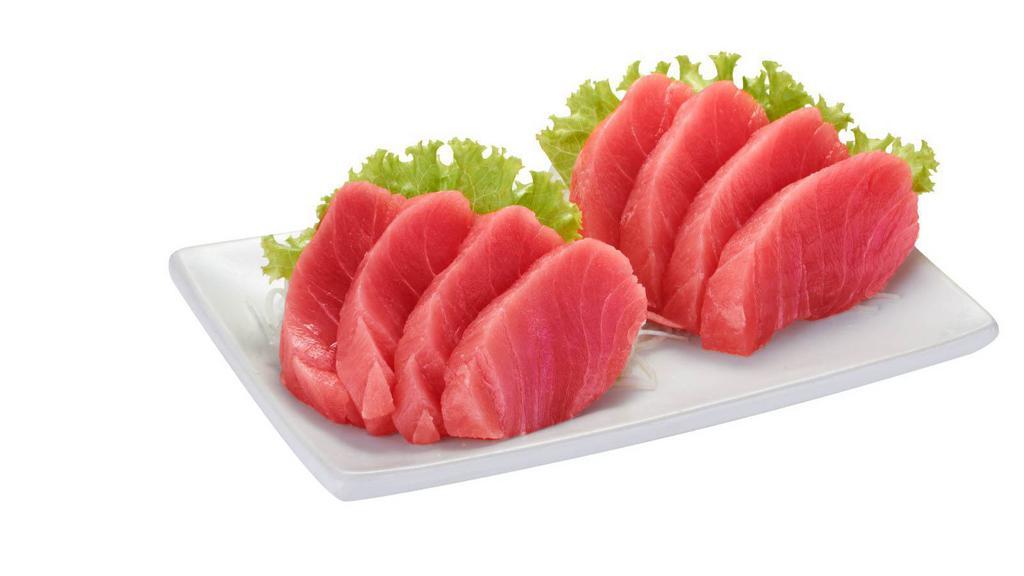 Maguro (Tuna) Sashimi  · Sliced raw Tuna served with daikon radish.