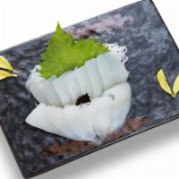 Ika (Squid) Sashimi  · Sliced raw Squid meat served with daikon radish.