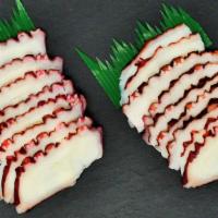 Tako (Octopus) Sashimi · Sliced raw Octopus meat served with daikon radish.