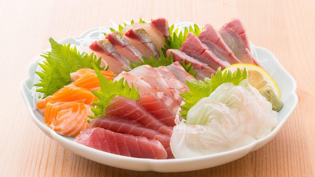 Deluxe Sashimi Plate · 18 pieces of Sashimi served in Chef's choice.