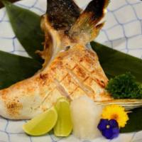 Hamachi Kama · Grilled Yellowtail fish collar seasoned with salt and red pepper.
