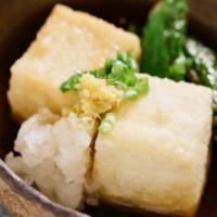 Agedashi Tofu · Fried Tofu topped with Bonito, seaweed, green onions, and Tempura sauce.