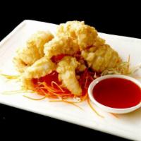 13.  Calamari Tempura · Fried crispy calamari served w/sweet & sour sauce