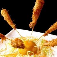 15.  Angel Prawns · Fried crispy prawns, minced coconut & bread crumb, served w/sweet & sour sauce