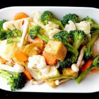 97.  Sautéed Mixed Veggie · Sautéed assorted vegetables, mushrooms & garlic in soy sauce