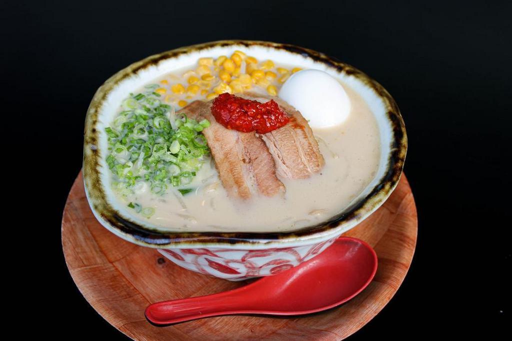 Spicy Miso Ramen · Miso Ramen with chicken broth topped with original spicy paste.


Ingredients: Medium thick curly noodle, chicken broth, chashu pork, spicy paste, bean sprouts, green onion, corn, sesame seeds and seasoned boiled egg.