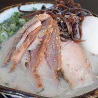 Premium Chashu Ramen · Pork ramen with 7pcs of Smoked “Kunsei” Chashu

Ingredients: Thin noodle, pork broth, chashu...
