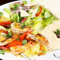 Prawn Kebab Plate · Brochettes of marinated prawns & veggies served with rice, hummus, salad & lavish bread.
