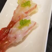 Ama-ebi  Nigiri  · 2pc sweet Canadian spot prawn, fried heads, sushi rice