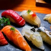 7pc Classic Nigiri · salmon, tuna, hamachi, and 4pc chef choice nigiri.