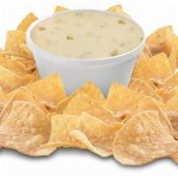 Chips & Queso (Regular) · Creamy Queso Blanco served with a large bag of fresh, house-made tortilla chips. Great for s...