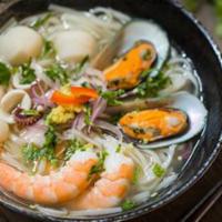 N5. Seafood Noodle · Pho Noodle in Chicken Soup with Shrimp, Calamari, Scallop, Fish Ball & Mussels, Topped with ...
