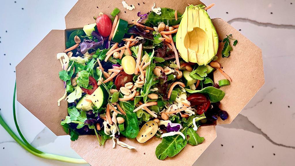 Asian Style Salad with Sesame Dressing  · **Sesame Dressing: Vegan, Keto, Gluten Free, Contains Peanuts**
Organic mixed greens, shredded cabbage, avocado, shredded carrots, cherry tomatoes, cucumber, sesame seeds, cilantro, green onions, peanuts (Vegan)